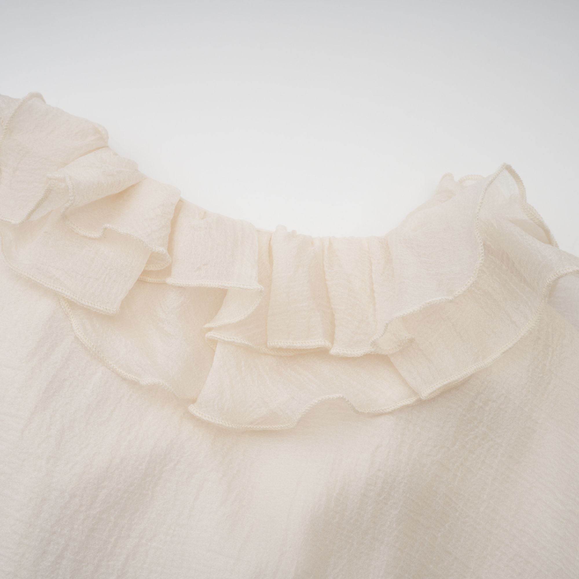 Elegant Zephyrine Floral Applique Tiered Mini Dress in Neutral Tones